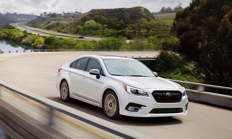 view of white 2018 Subaru Legacy on the road