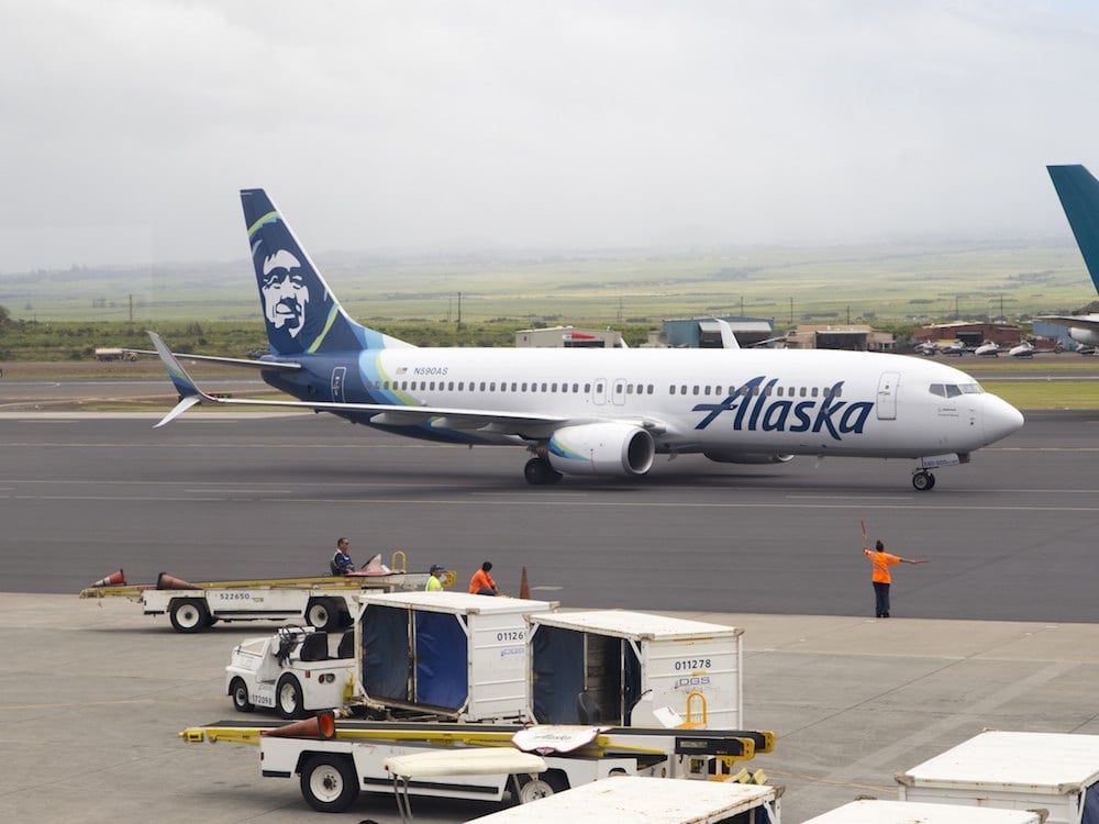 An Alaska Airlines plane taxiing to the gate