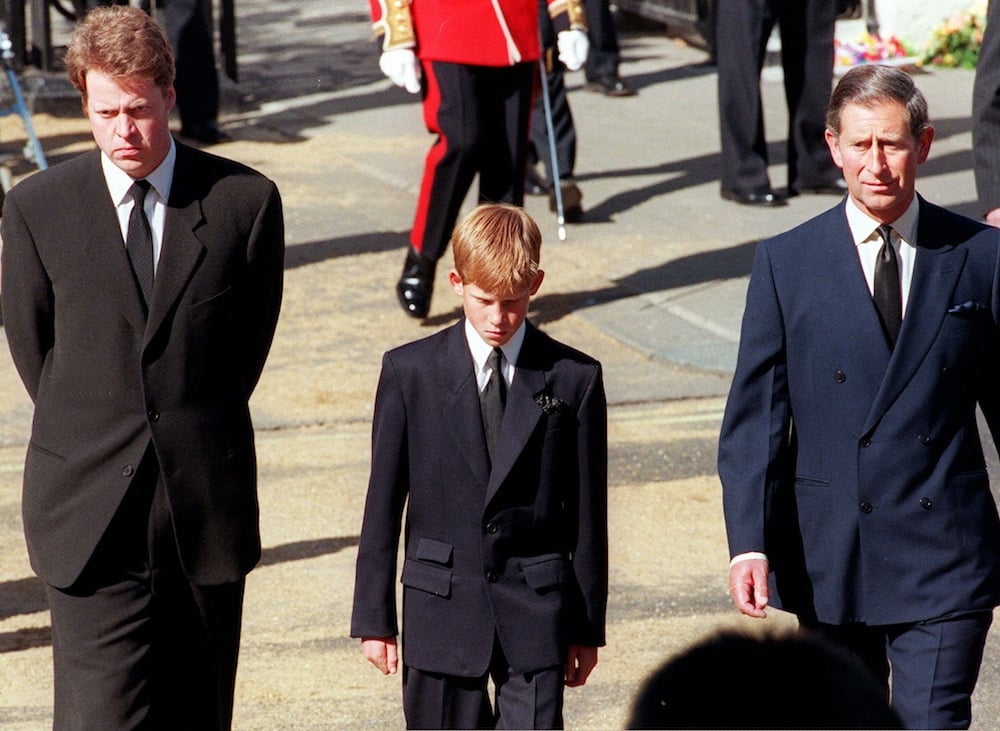 Earl Spencer, Diana's brother, Prince Harry, her son, and Prince Charles, her former husband, join the gun carriage carrying the coffin
