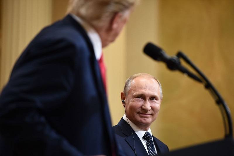 US President Donald Trump and Russia's President Vladimir Putin attend a joint press conference after a meeting at the Presidential Palace in Helsinki, on July 16, 2018.