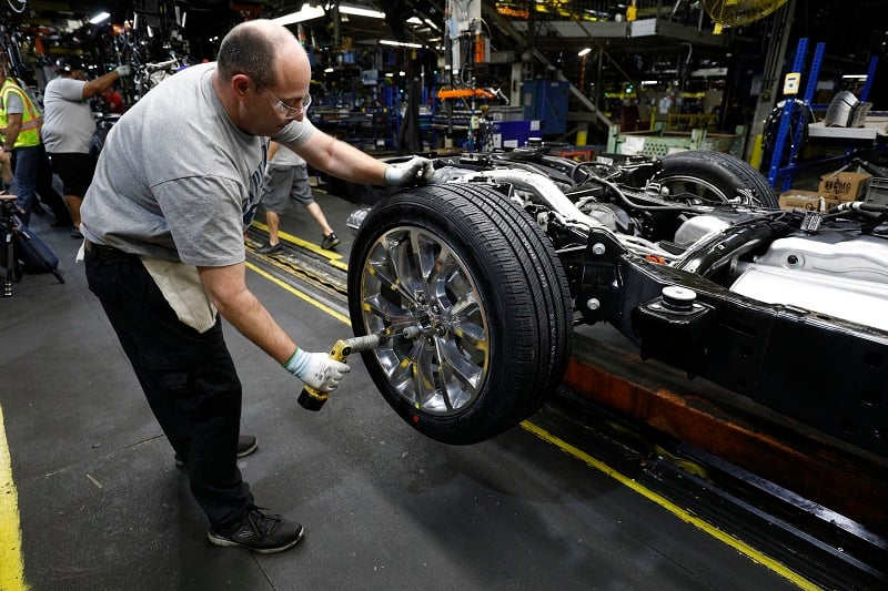 LOUISVILLE, KY - OCTOBER 27: A worker builds the all-new 2018 Ford Expedition SUV as it goes through the assembly line at the Ford Kentucky Truck Plant October 27, 2017 in Louisville, Kentucky. Ford recently invested $900 million in the plant for upgrades to build the all-new Expedition and Lincoln Navigator, securing 1000 hourly U.S. jobs.