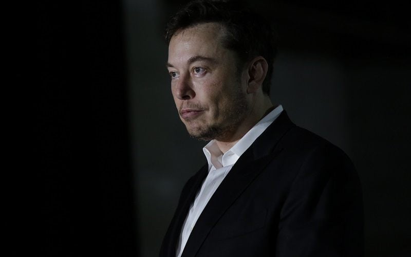 Engineer and tech entrepreneur Elon Musk of The Boring Company listens as Chicago Mayor Rahm Emanuel talks about constructing a high speed transit tunnel at Block 37 during a news conference on June 14, 2018 in Chicago, Illinois. Musk said he could create a 16-passenger vehicle to operate on a high-speed rail system that could get travelers to and from downtown Chicago and O'hare International Airport under twenty minutes, at speeds of over 100 miles per hour.