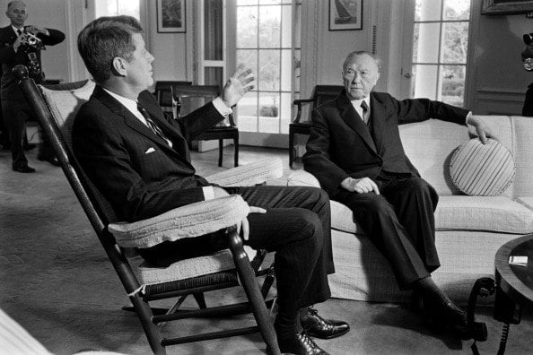 German Chancellor Konrad Adenauer (R) listens to U.S. President John F. Kennedy (L) German Chancellor Konrad Adenauer (R) listens to U.S. President John F. Kennedy (L)