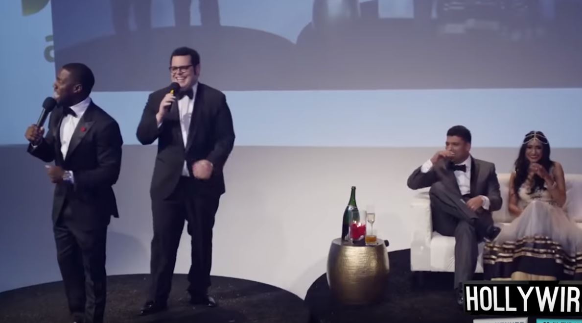 The newlyweds laugh during Kevin Hart and Josh Gad's cameo.