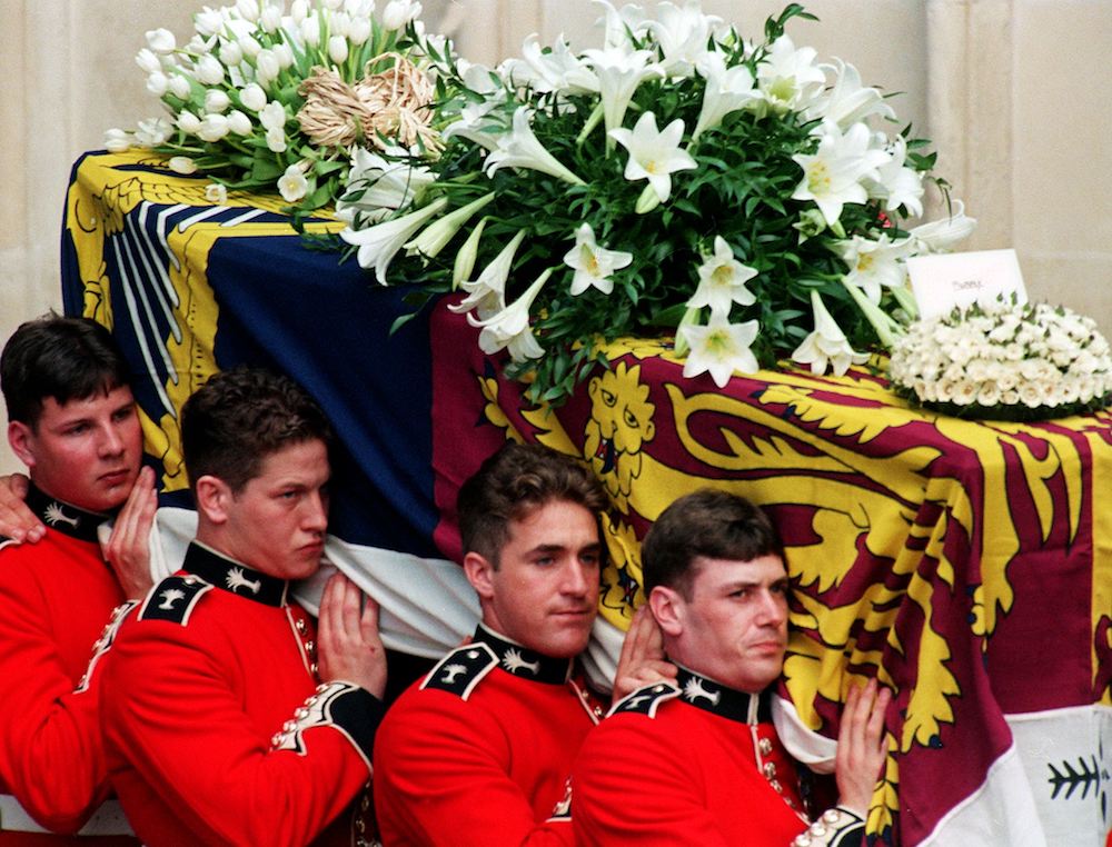 Welsh guards carry the coffin out of Westminster Abbey after Princess Diana's funeral