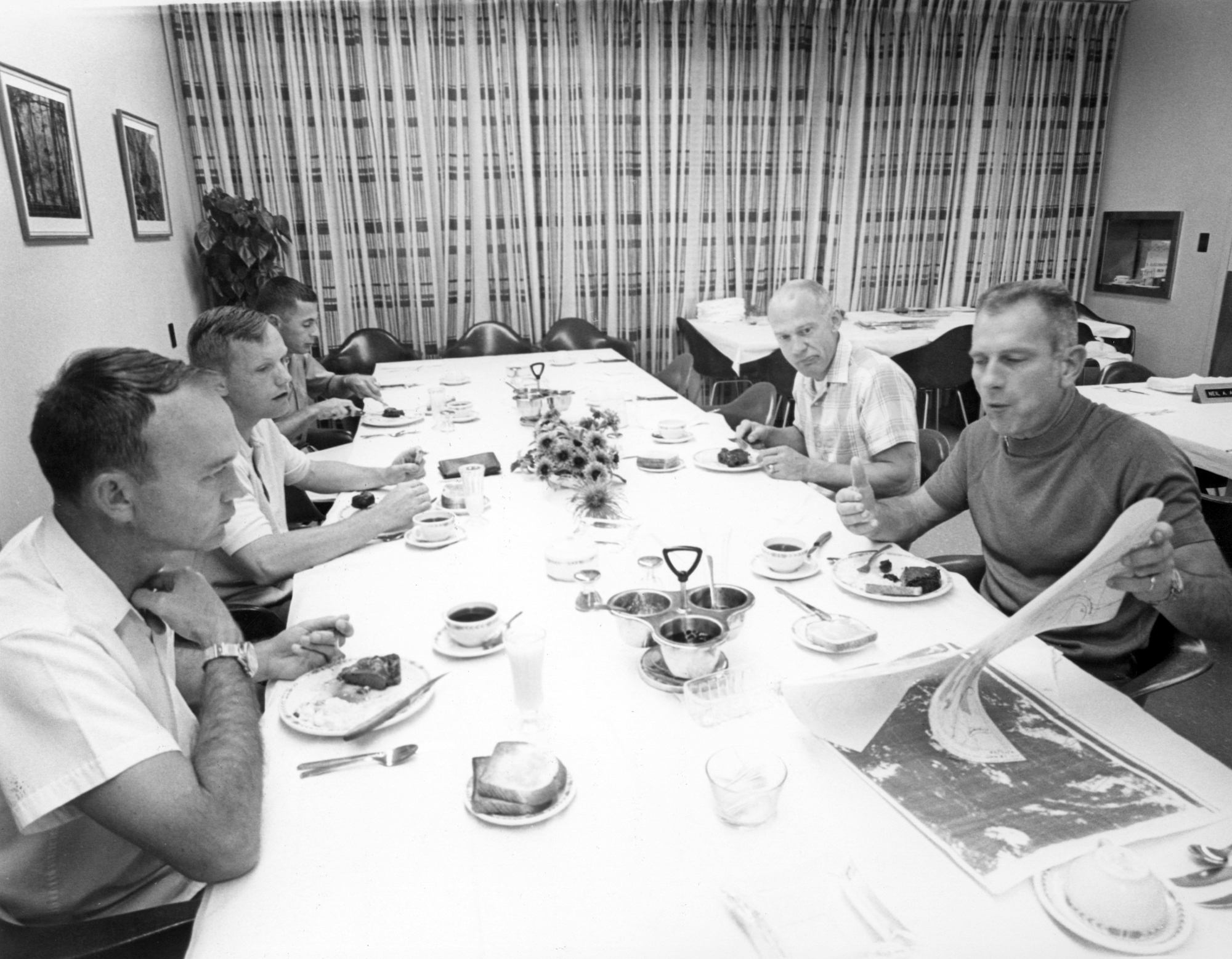 Apollo 11 astronauts review lunar charts before the first moon landing