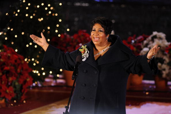 Aretha Franklin performs onstage at attends the Rockefeller Center Christmas tree lighting at Rockefeller Center on December 2, 2009 in New York City
