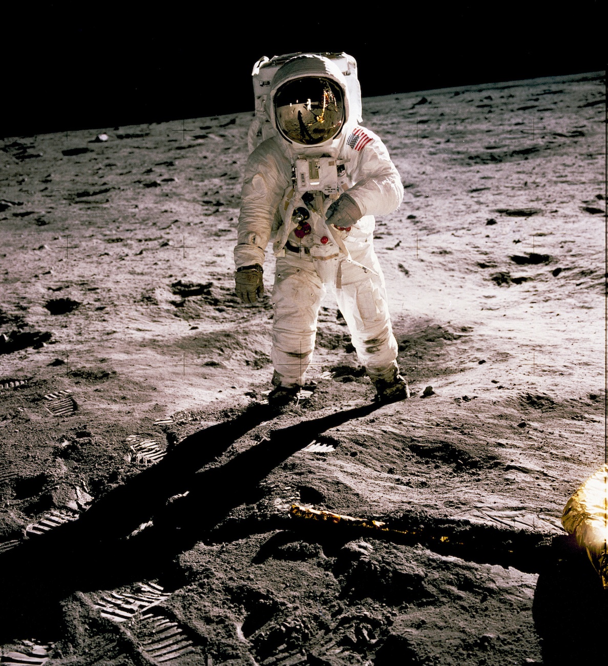 Buzz Aldrin during the first moon landing, with Neil Armstrong reflected in his visor