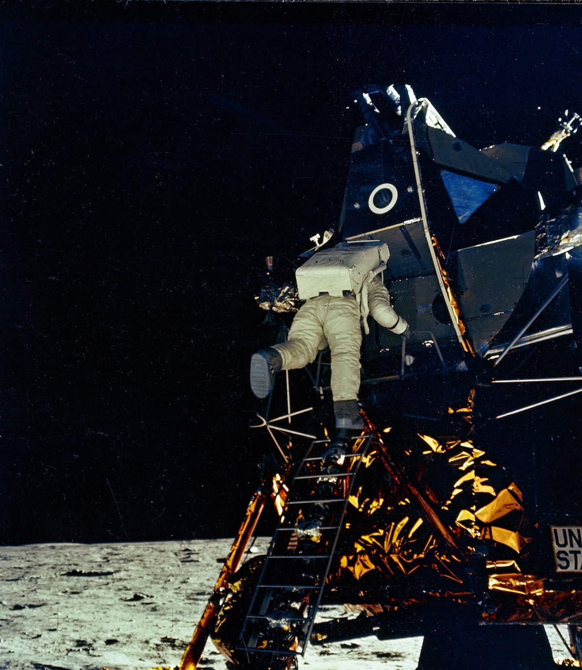 Buzz Aldrin prepares to take his first steps on the moon