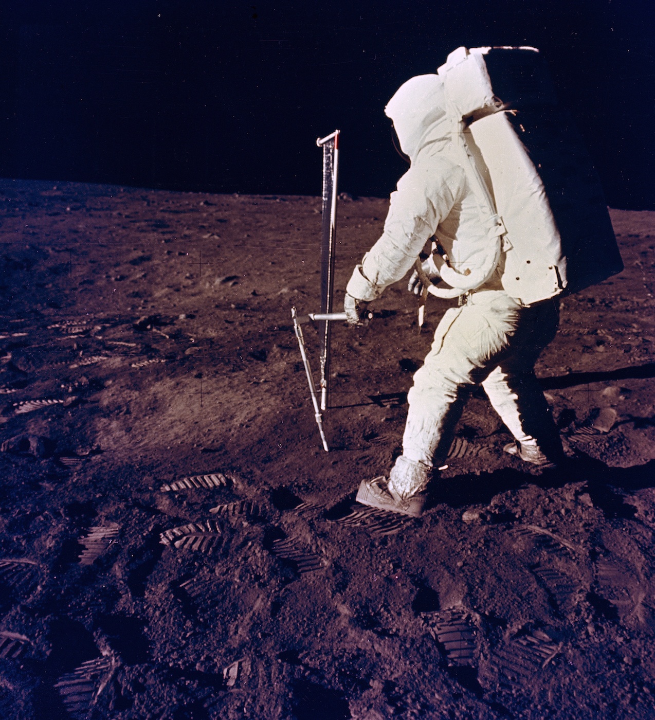 Buzz Aldrin uses the core sampler on the first moon landing