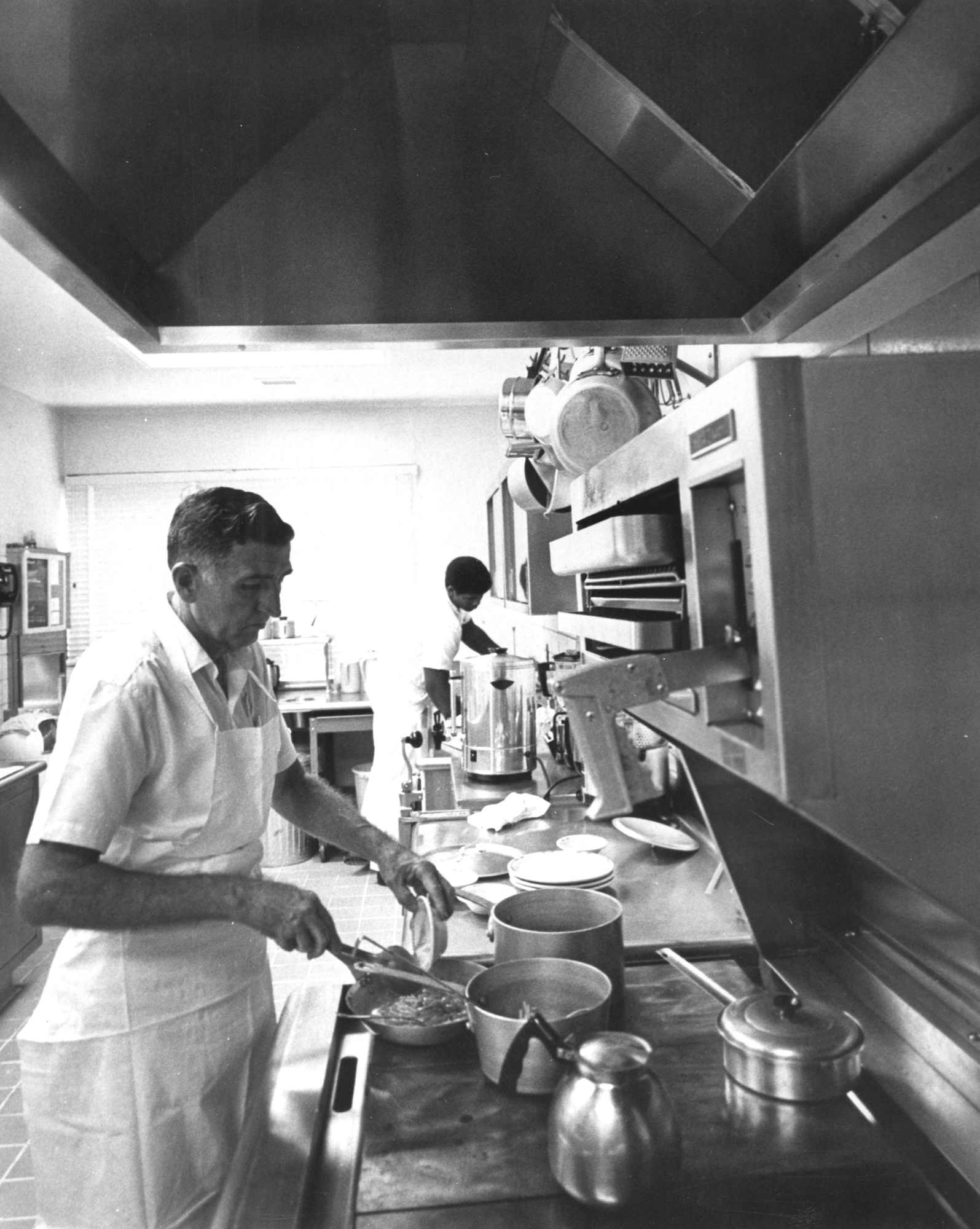 Cooks prepare meals for the Apollo 11 crew