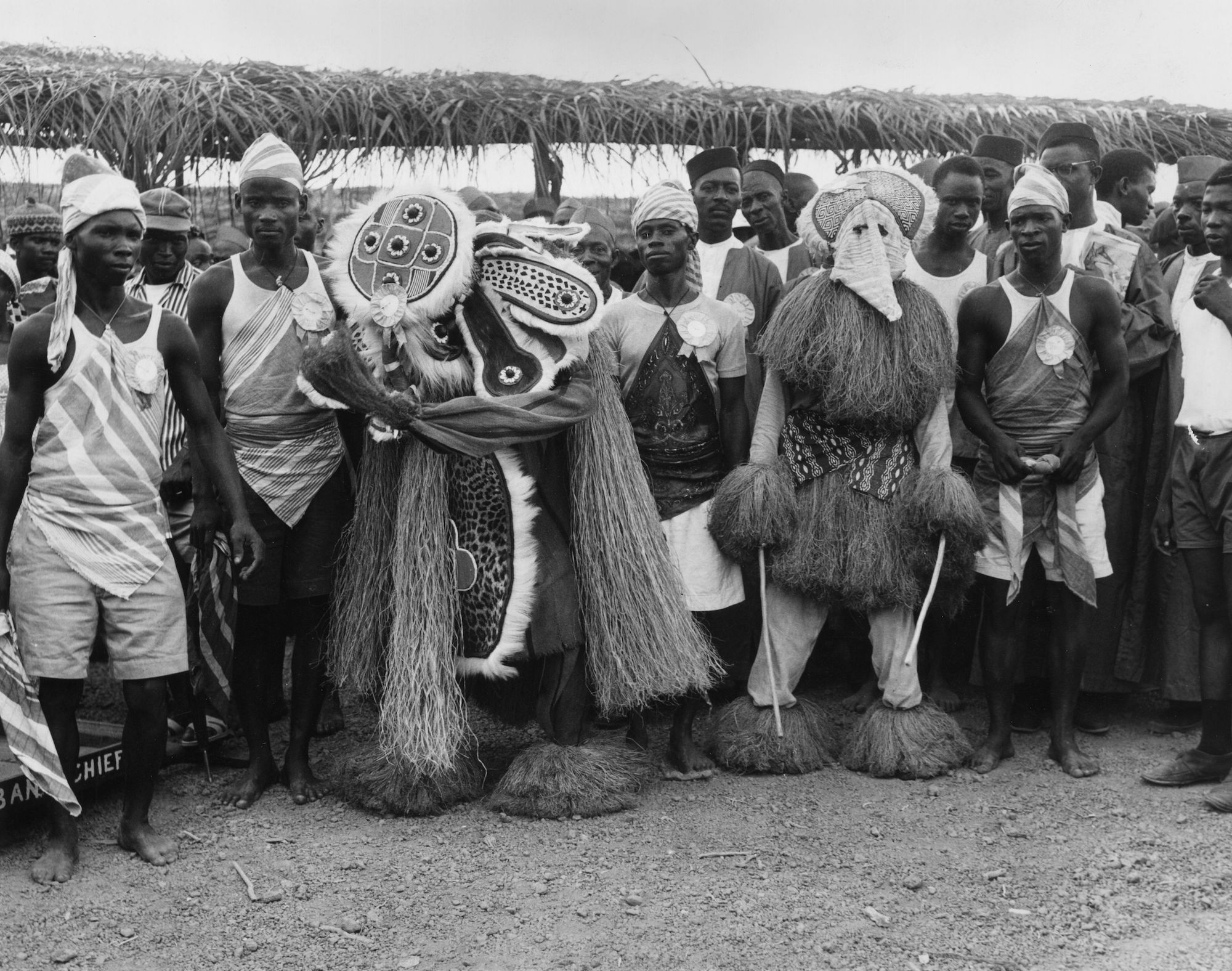 Dancers who performed a devil dance in front of Queen Elizabeth II at the Royal Durbar in Bo, Sierra Leone