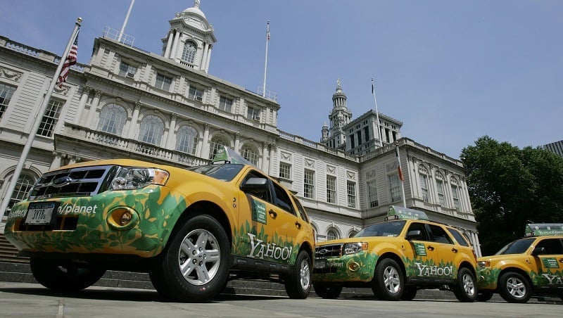 Three Ford Escape hybrid taxicabs donated by Yahoo! in front of New York's City Hall, 22 May 2007, as New York City Mayor Michael Bloomberg announced that the city's taxi fleet will be fully hybrid by 2012. The Taxi and Limousine Commission will implement new emissions and mileage standards phased in over the next four years for the more than 13,000 yellow taxicabs in New York.