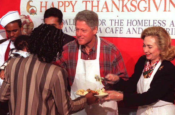 Bill and Hillary serve the homeless