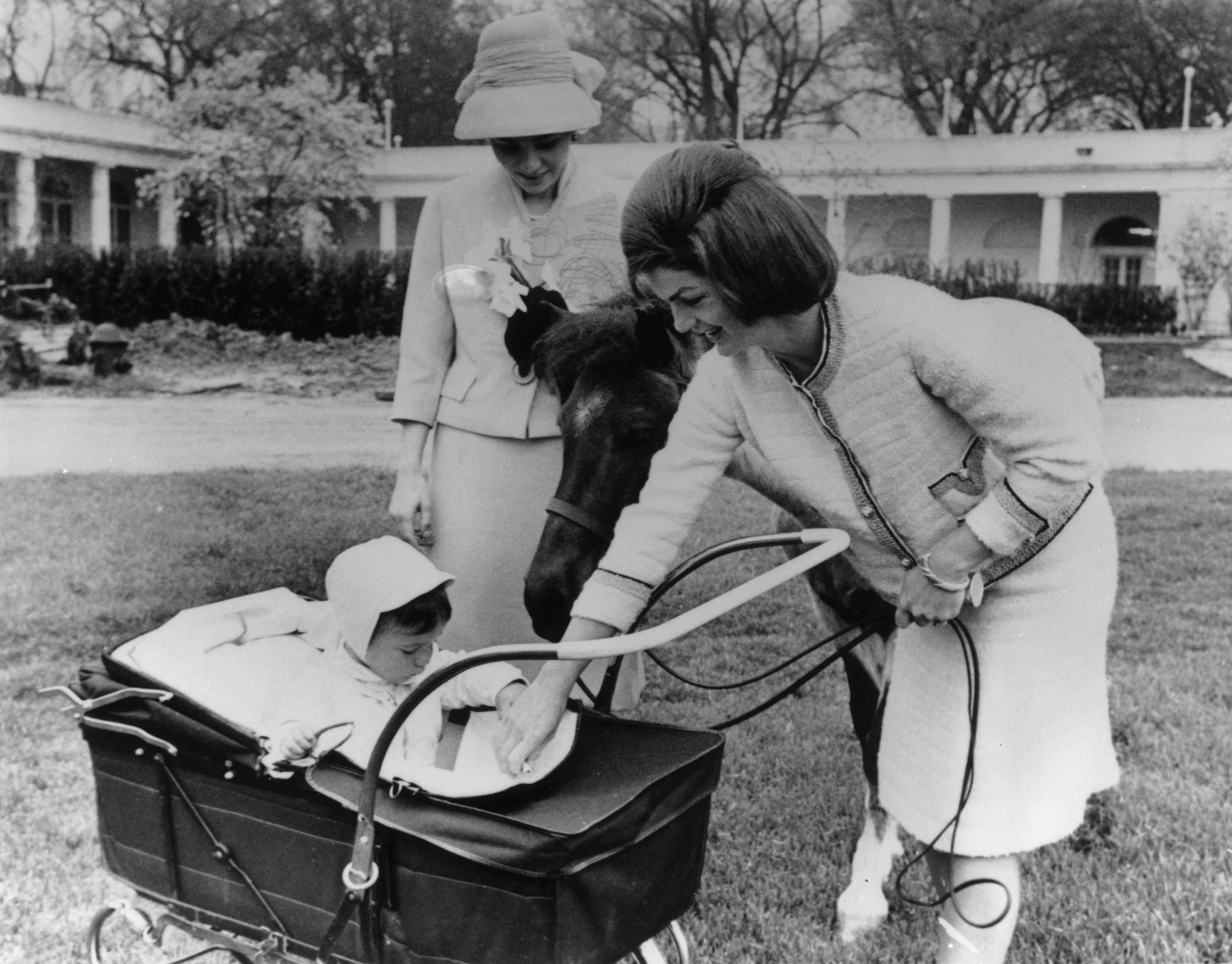 Jackie Kennedy introduces John Jr. to Farah, Empress Of Persia