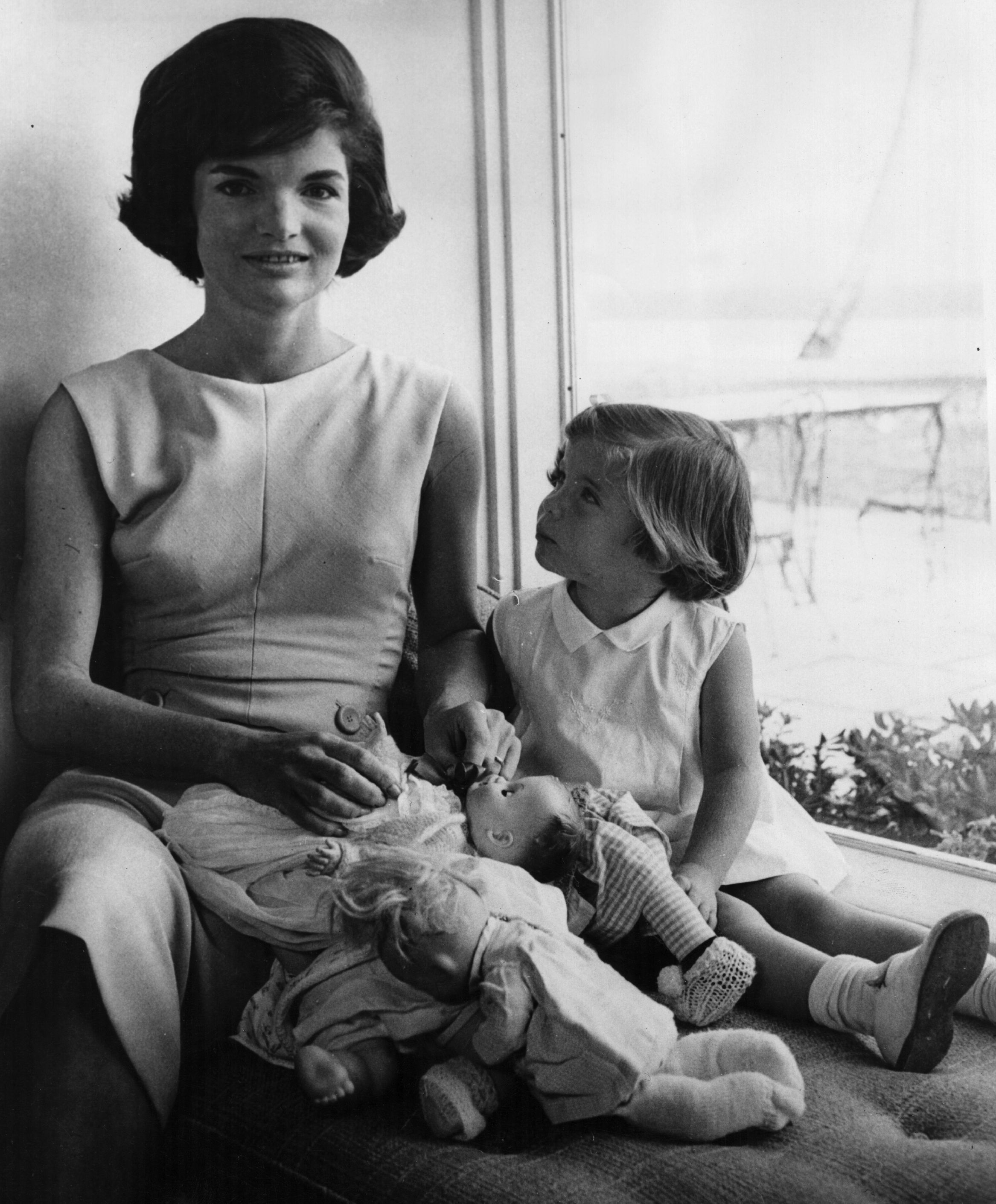 Jacqueline and Caroline Kennedy relax at home