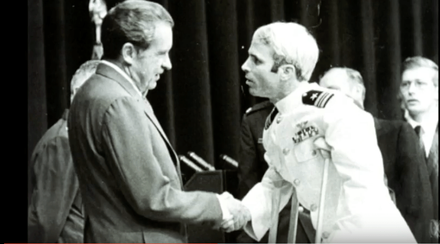 John McCain returning from Vietnam