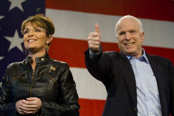 John McCain (R-AZ) and former Alaska Gov. Sarah Palin (L) attend a campaign rally at Pima County Fairgrounds on March 26, 2010