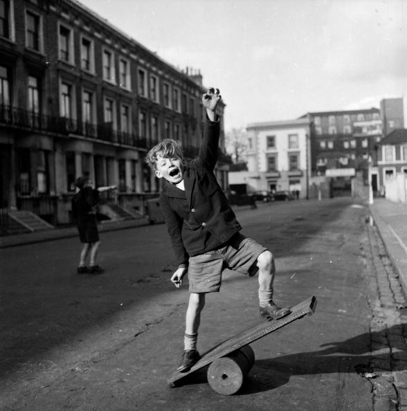 A boy enjoying himself on a Wiggle Board A boy enjoying himself on a Wiggle Board