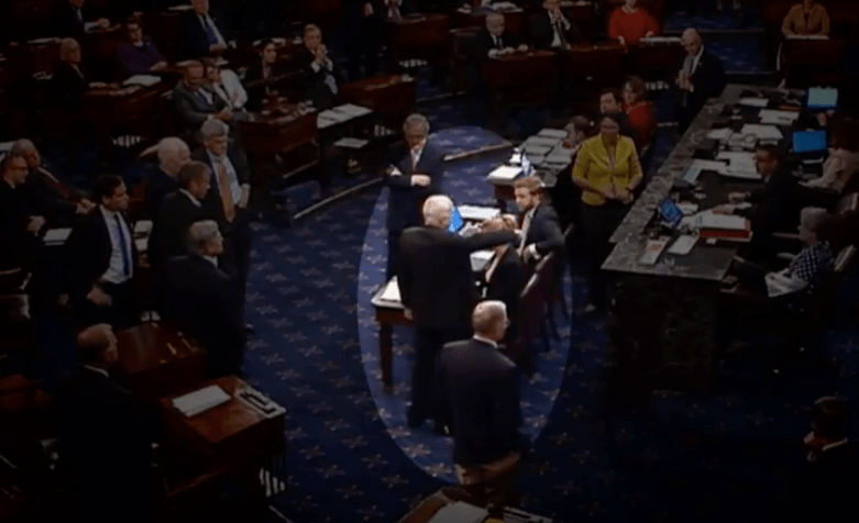John McCain voting against the repeal of Obamacare