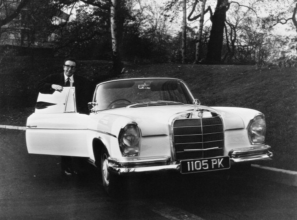 English comic actor Peter Sellers with his new Mercedes-Benz 300 SE Cabriolet (aka Mercedes-Benz W112), 7th November 1962.