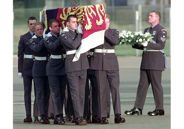 The coffin of Diana, Princess of Wales is carried off a plane of the Royal Squadro