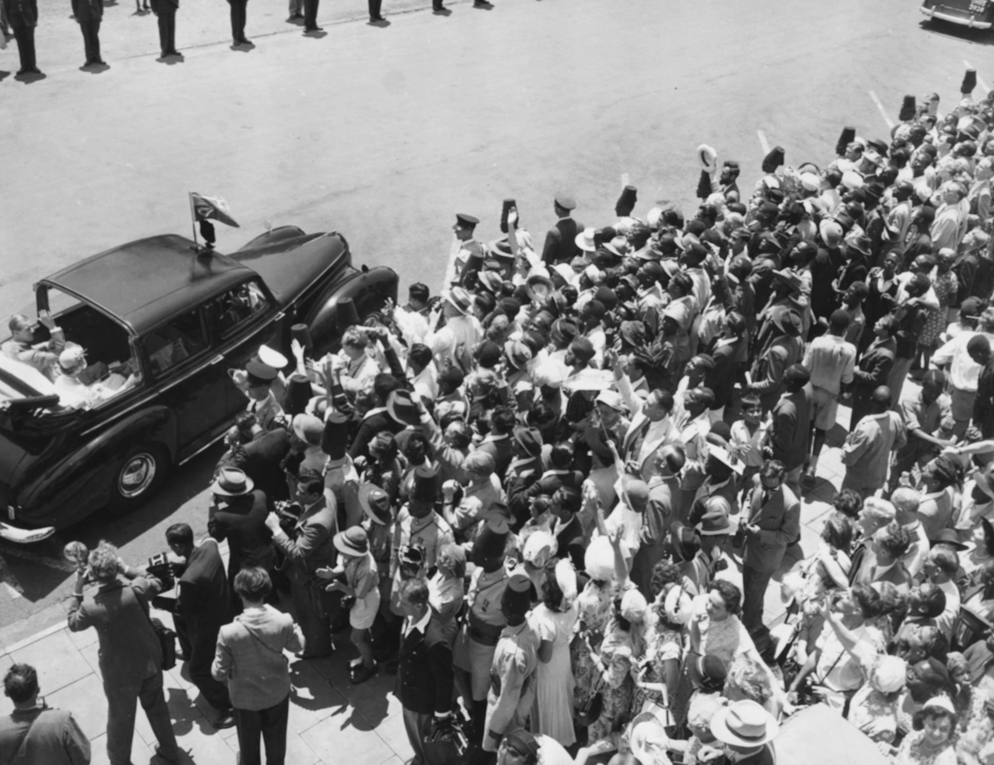 Princess Elizabeth and Prince Philip leave the Council Chambers in Kenya