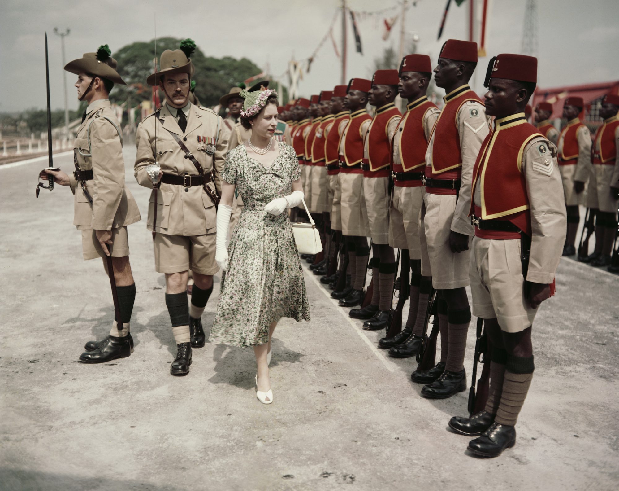 Queen Elizabeth II inspects men of the newly-renamed Queen's Own Nigeria Regiment, Royal West African Frontier Force, at Kaduna Airport, Nigeria