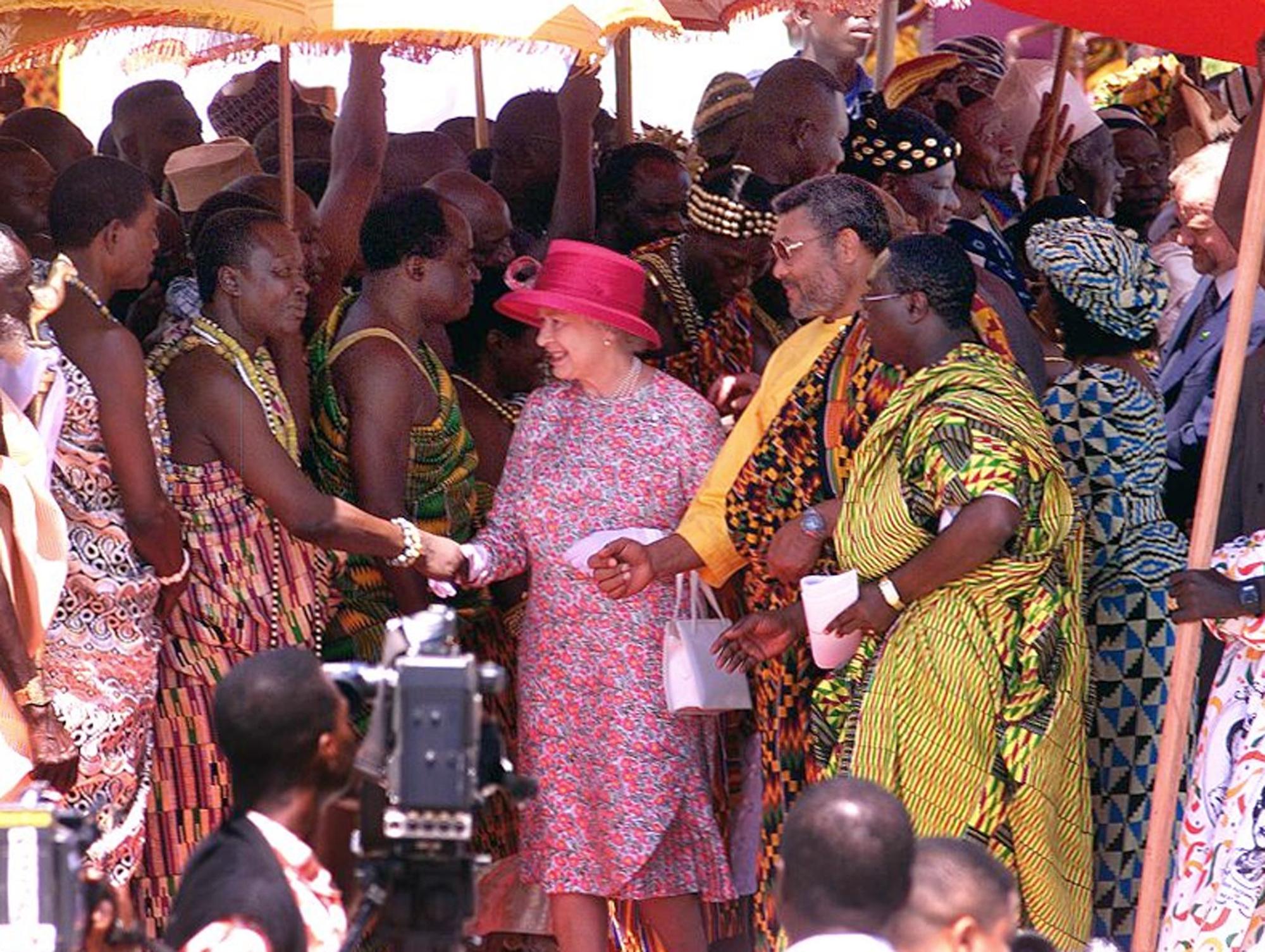 Queen Elizabeth II shakes hands with a Ghanian tribal chief