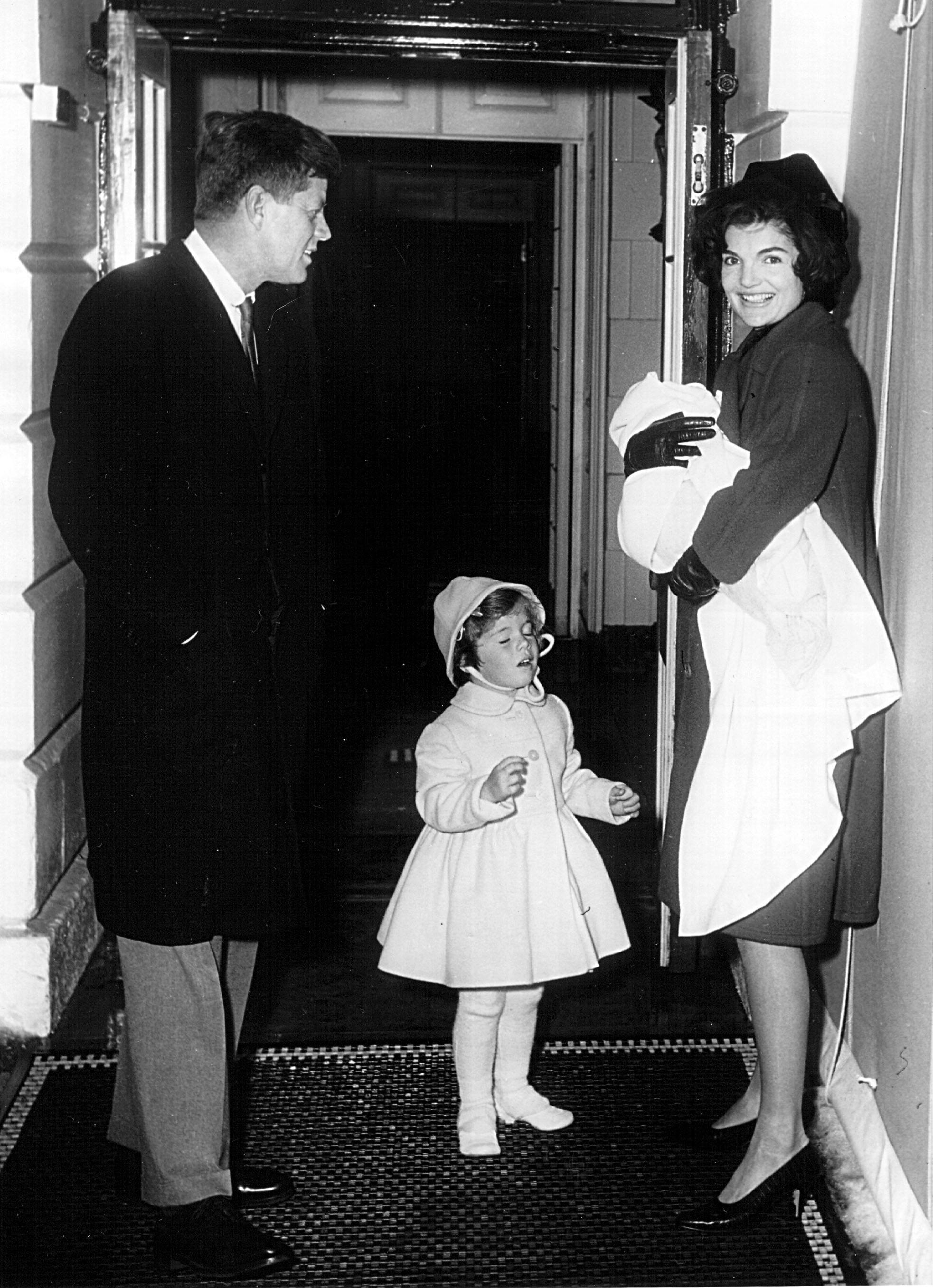 The Kennedy family arrives at the White House