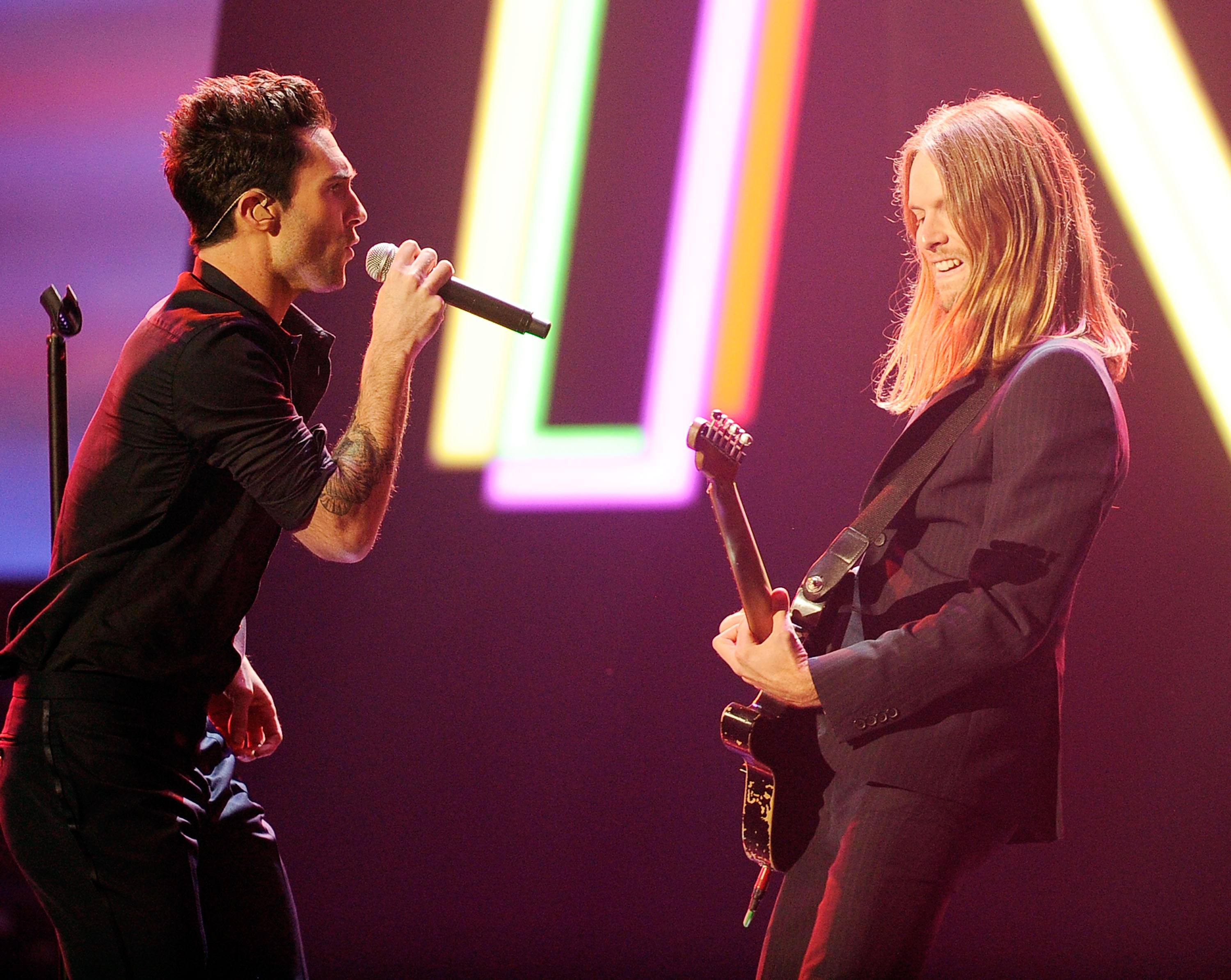 Adam Levine and James Valentine of Maroon 5 perform onstage at the 2011 American Music Awards Adam Levine and James Valentine of Maroon 5 perform onstage at the 2011 American Music Awards