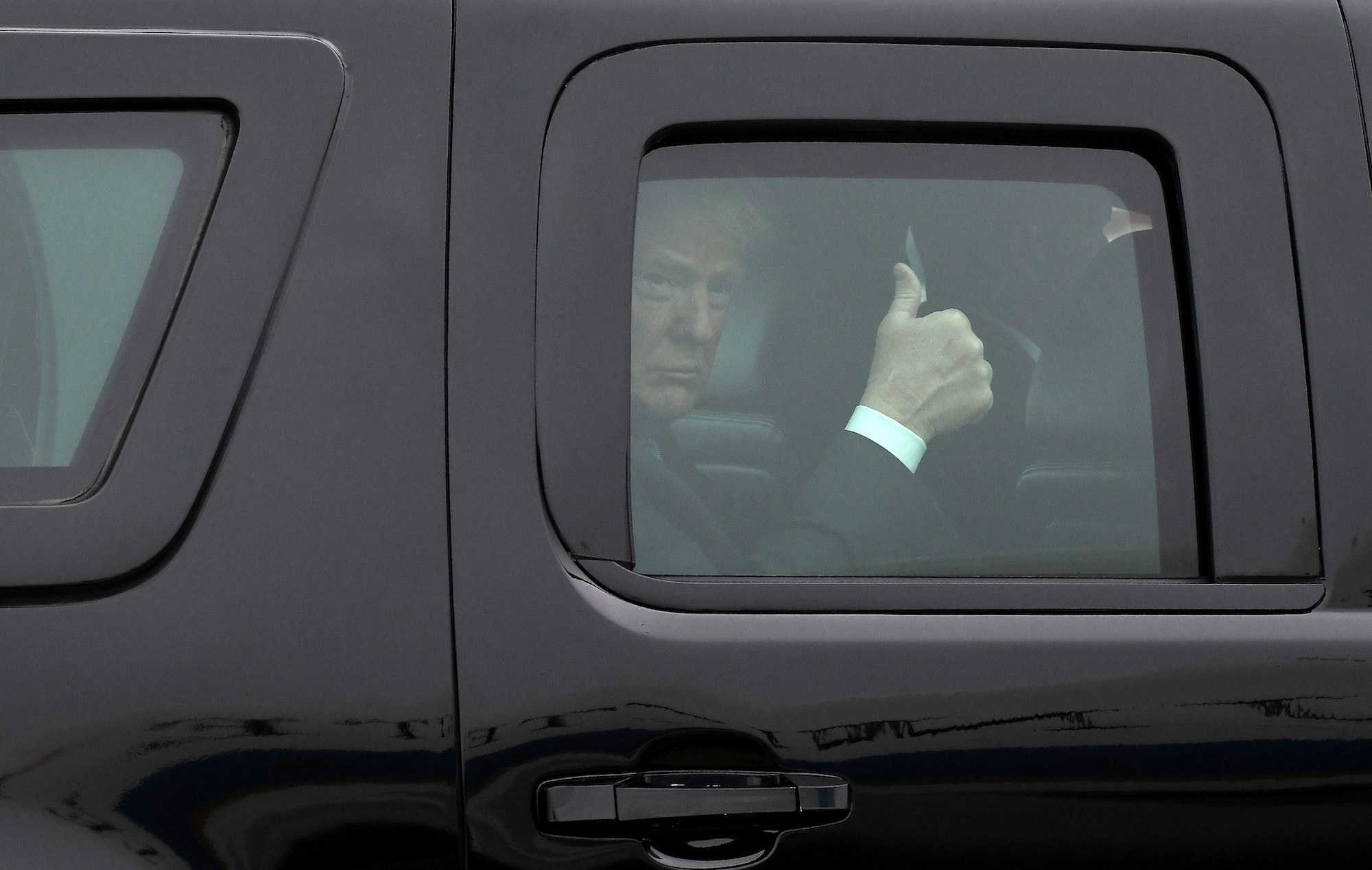 Donald Trump arrives on motoracde to board Air Force One