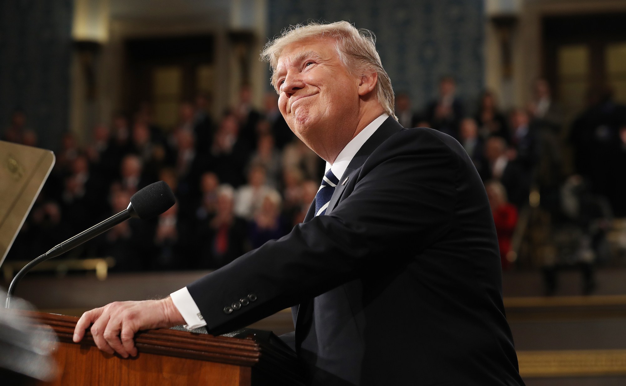 Donald Trump arrives to deliver an address to a joint session of the U.S. Congress