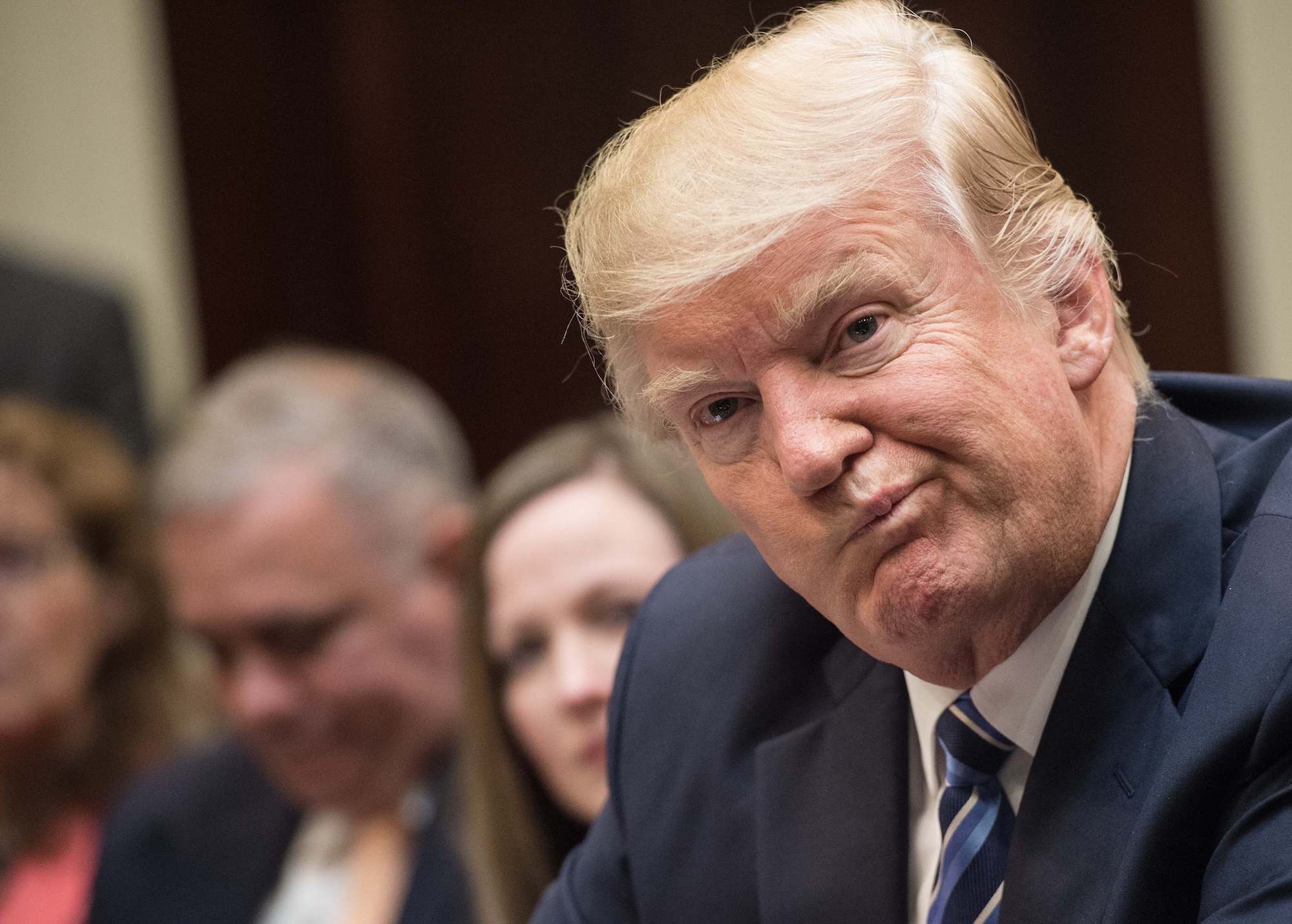Donald Trump attends a meeting about healthcare in the Roosevelt Room