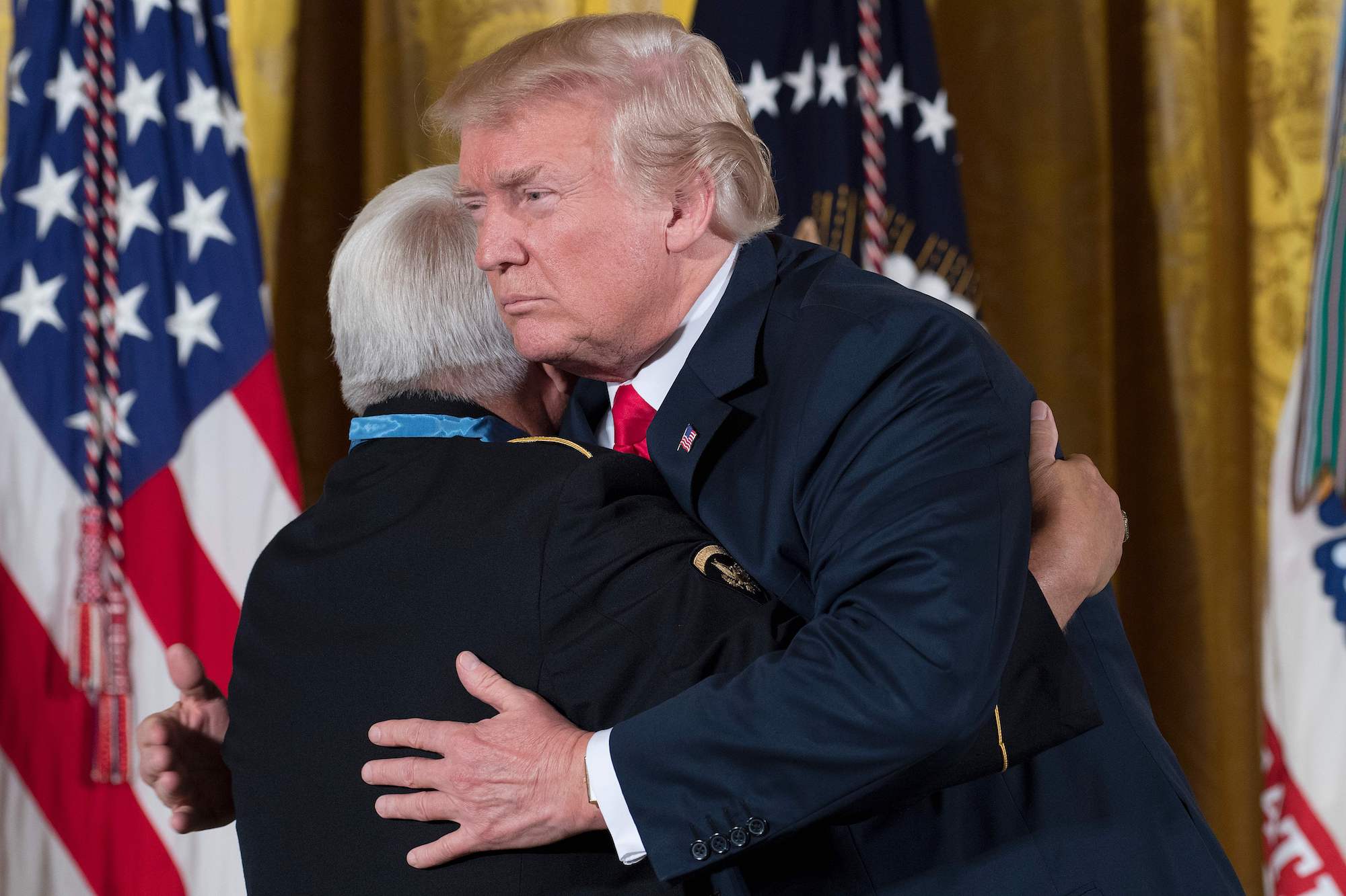 Donald Trump hugs retired Army medic James McCloughan