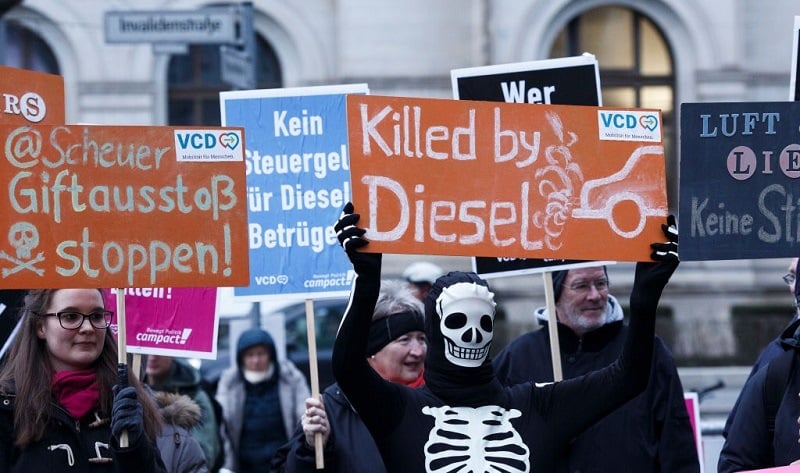 Protesters show banners during a bicycles protest against the ongoing diesel affair in front of the Transport Ministry on the day new Transport Minister Andreas Scheuer took office on March 14, 2018 in Berlin, Germany. A German court recently ruled that cities may impose bans on diesel cars in order to bring down air pollution. Many diesel car owners are furious at German automakers, particularly Volkswagen, following the illegal software scandal that enabled diesel cars with high emissions to still pass emissions tests. Public confidence in diesel technology in Germany has plummeted as some critics even predict the demise of the technology altogether.