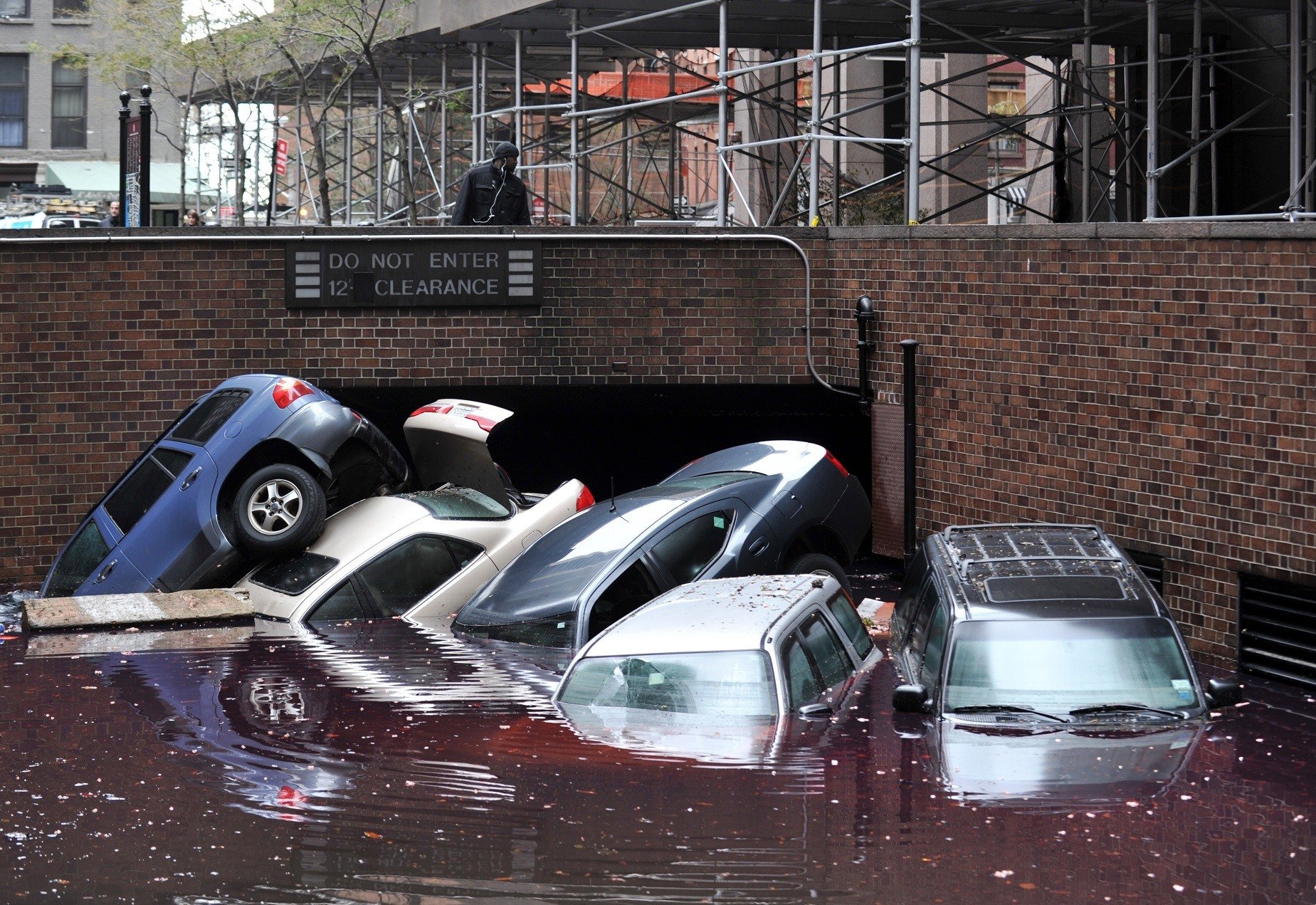 Hurricane damage from superstorm Sandy in Manhattan, NY -- That's not how cars are supposed to be