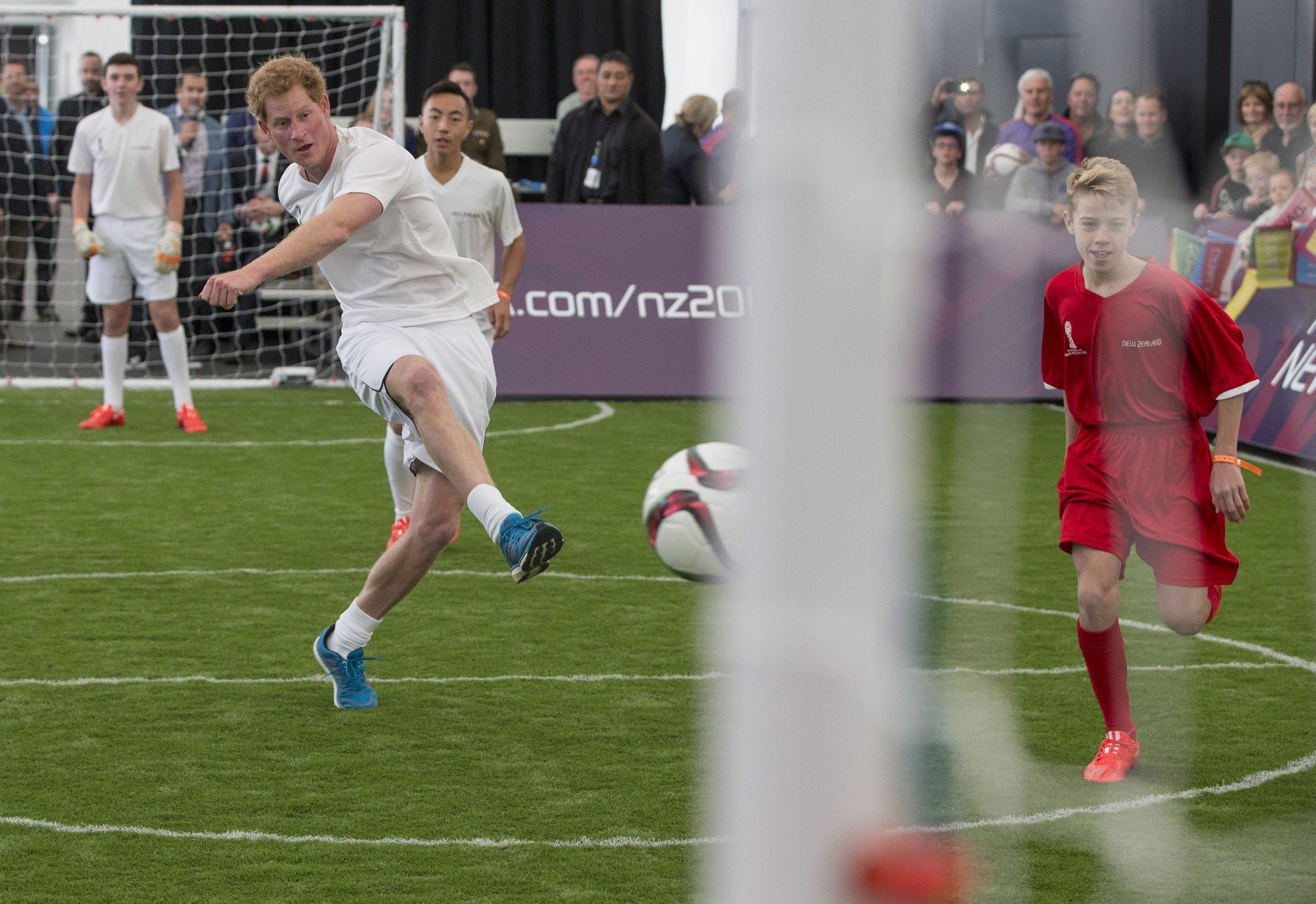What are Prince William and Harry's favorite soccer teams Prince Harry playing soccer