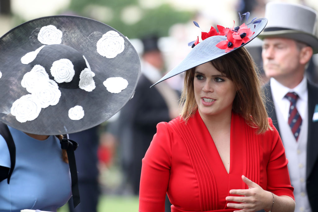 Princess Eugenie of York (R) and Princess Beatrice of York (L) are seen in the Parade Ring as she attends Royal Ascot 2017