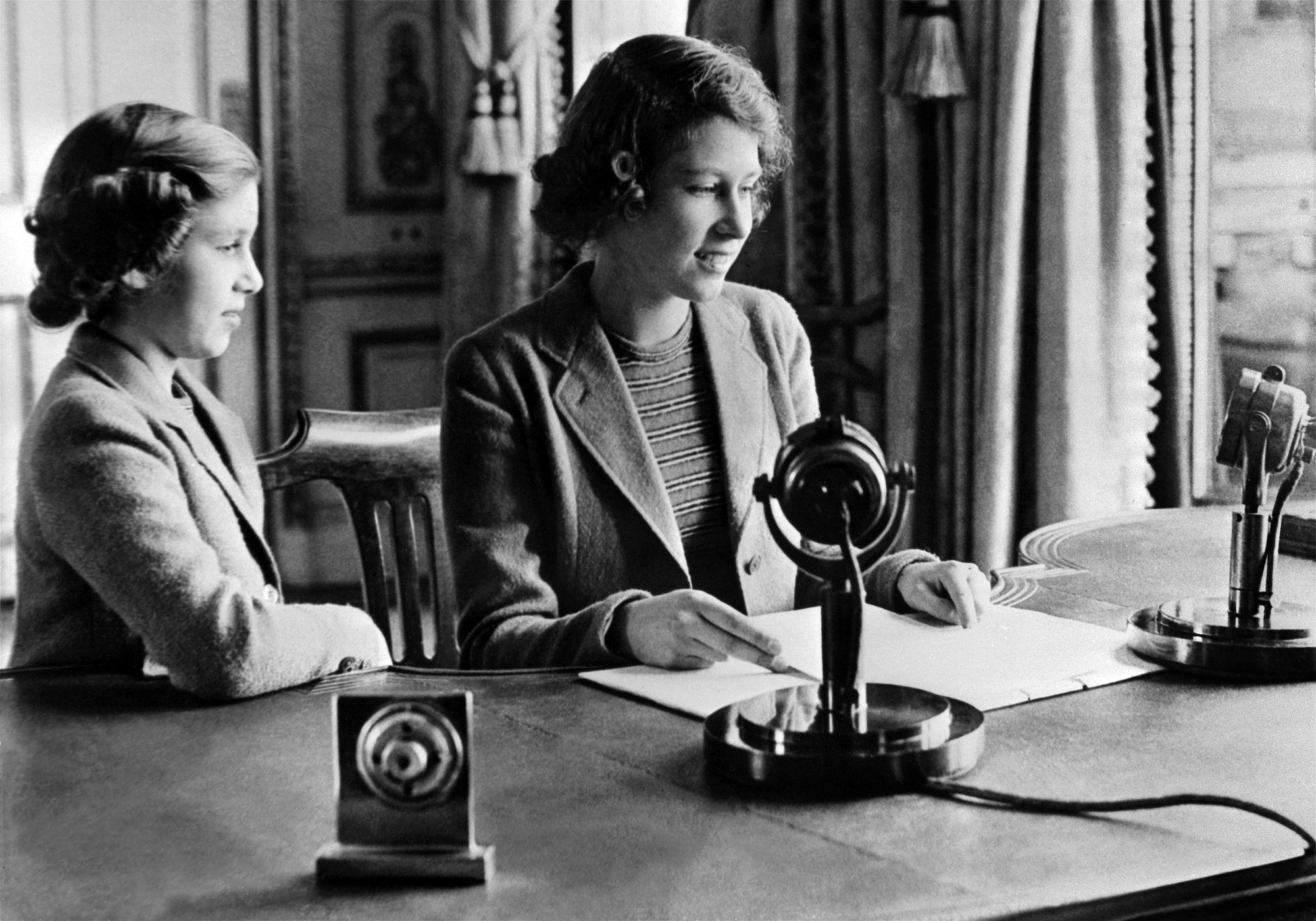 Princess Margaret and Princess Elizabeth sending a message during the BBC's children programme
