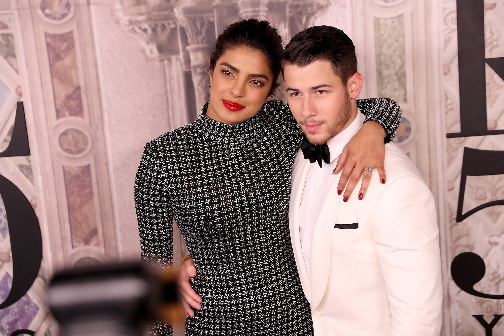 Priyanka Chopra and Nick Jonas attend the Ralph Lauren fashion show during New York Fashion Week