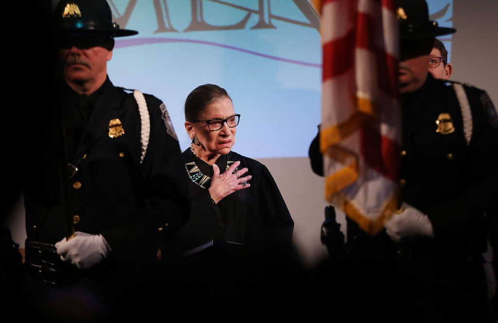 U.S. Supreme Court Justice Ruth Bader Ginsburg prepares to administer the Oath of Allegiance to candidates for U.S. citizenship