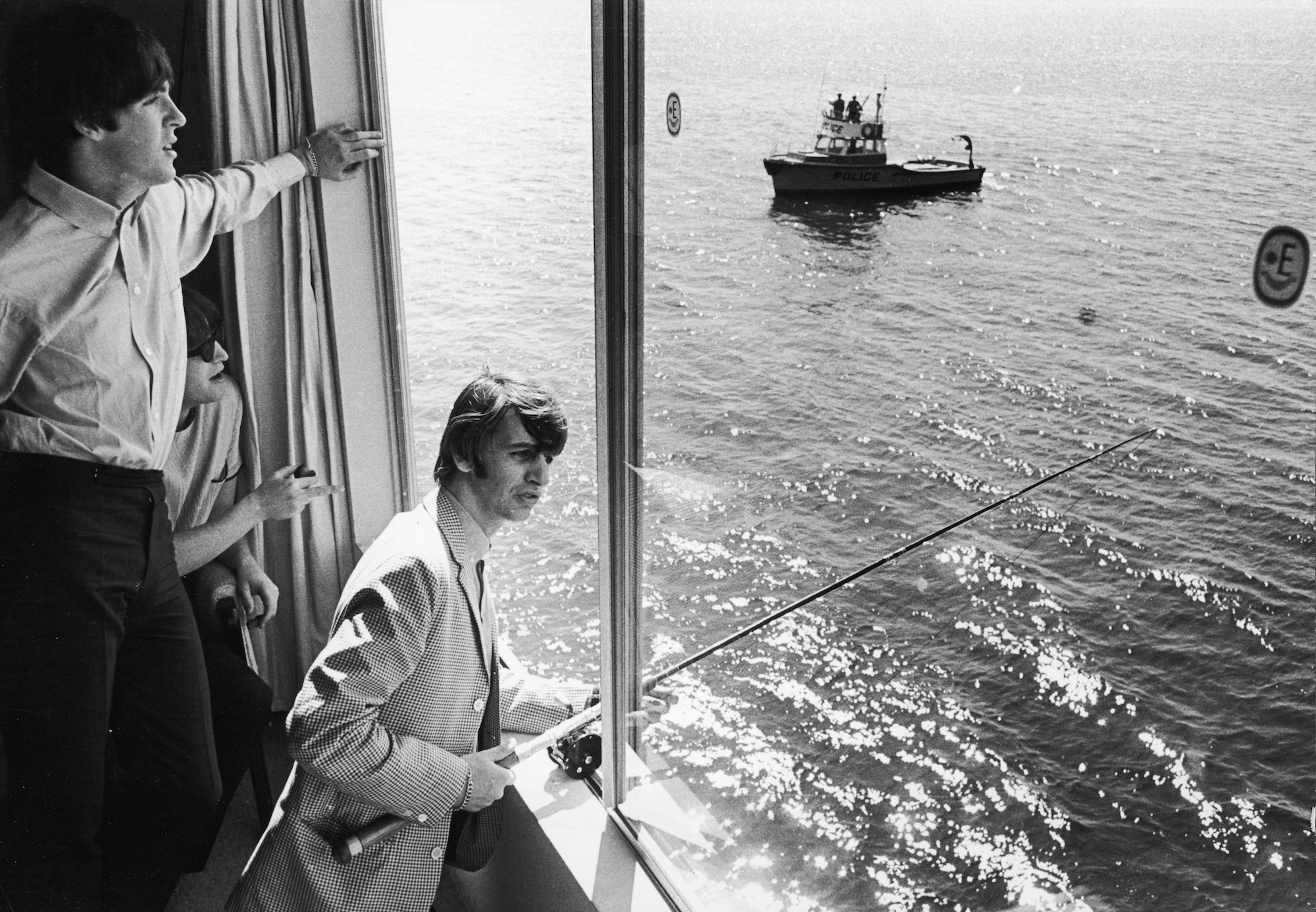 Ringo Starr fishes from The Beatles' Seattle hotel room