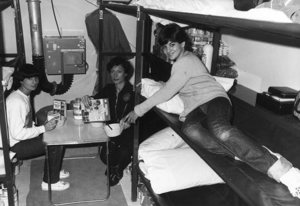 1980: Phyllis Millet and her daughters Roberta and Katie (right) having breakfast in their underground nuclear shelter during a five day trial.