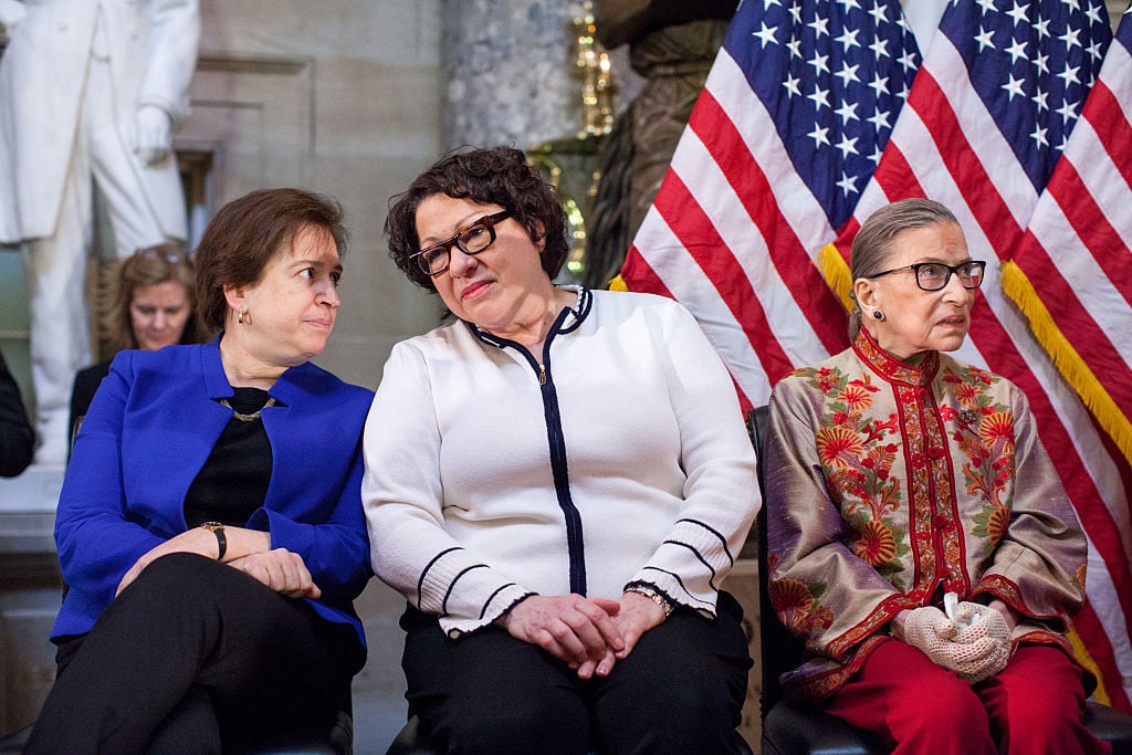 Supreme Court justices Elena Kagan, Sonia Sotomayor and Ruth Bader Ginsburg, participate in an annual Women's History Month reception