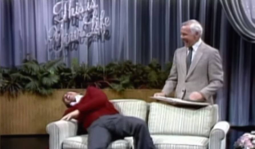 Burt Reynolds sharing a laugh with Johnny Carson