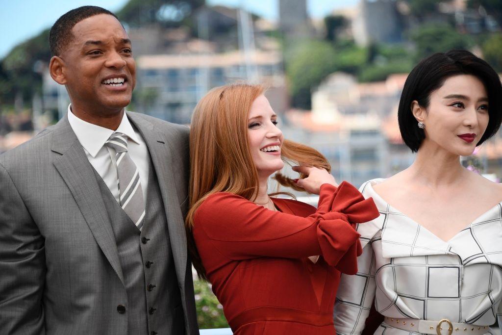 Fan Bingbing poses with Will Smith and Jessica Chastain at the 70th annual Cannes Film Festival 
