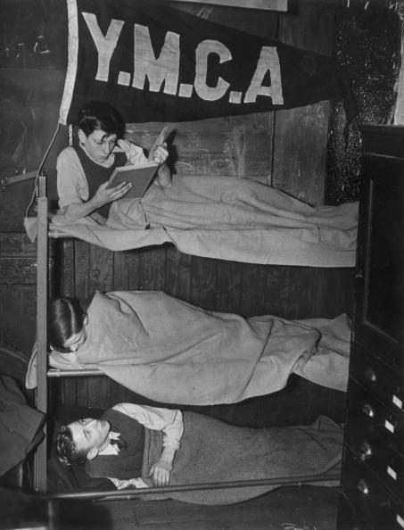 Boys tucked up in their bunk beds at the Bow Road YMCA Boys Club Boys tucked up in their bunk beds at the Bow Road YMCA Boys Club