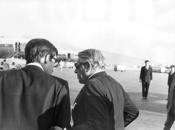 Greek shipping magnate Aristotle Onassis chats with his son Alexander at Athens Airport in 1970