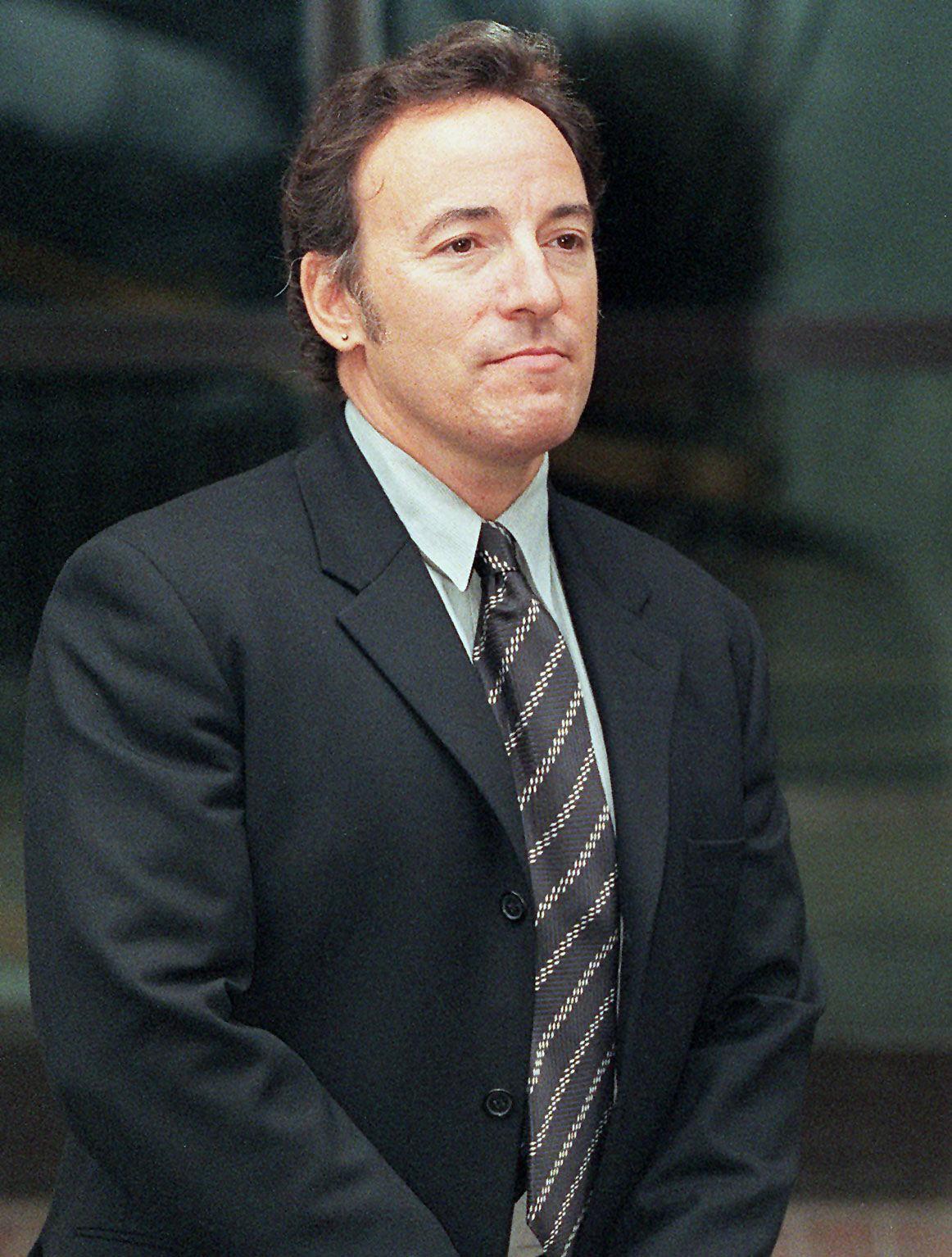 Bruce Springsteen leaving British court